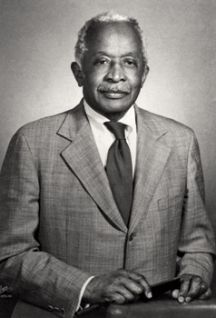 This black-and-white photo is a portrait of Louis L. Redding, one of the first Black lawyers in Delaware, who later worked with a group of lawyers on the Brown v. Board of Education case of 1954.