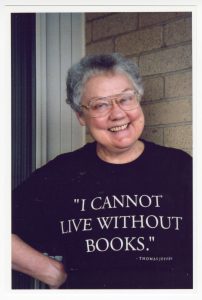 This image shows Barbara Gittings, a Wilmington resident known by some as the "Mother of the Gay Rights Movement" wearing a black t-shirt that says "I cannot live without books," a quote by Thomas Jefferson.