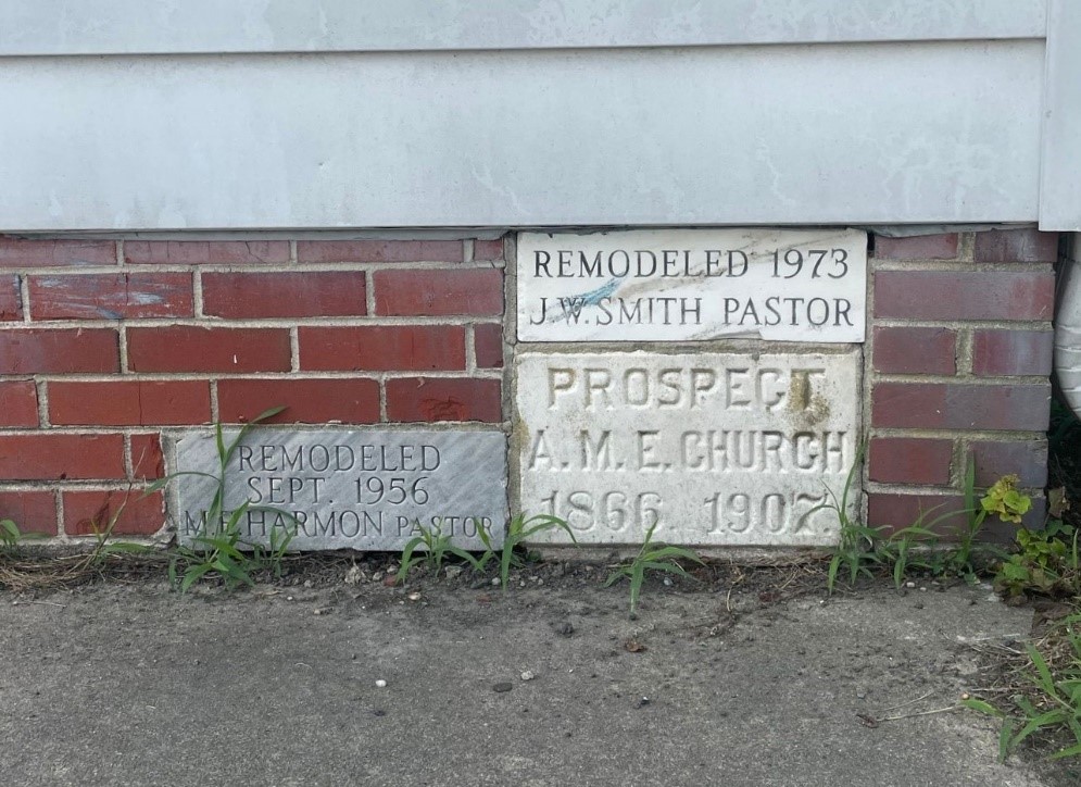 Image of cornerstones on facade of Prospect A.M.E. Church dating renovations made to the building, reading as follows: 

Prospect A.M.E. Church 1866. 1907. 
Remodeled September 1956, M.E. Harmon, Pastor
Remodeled 1973, J.W. Smith, Pastor