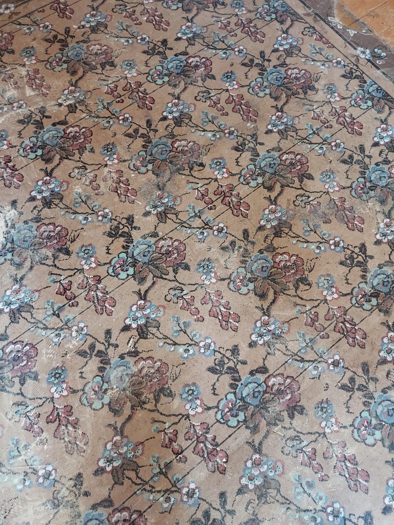 Pattern and design examples of oil cloth, a decorative floor covering shown here, ranged in a wide variety of styles from bright geometric patterns to floral motifs.