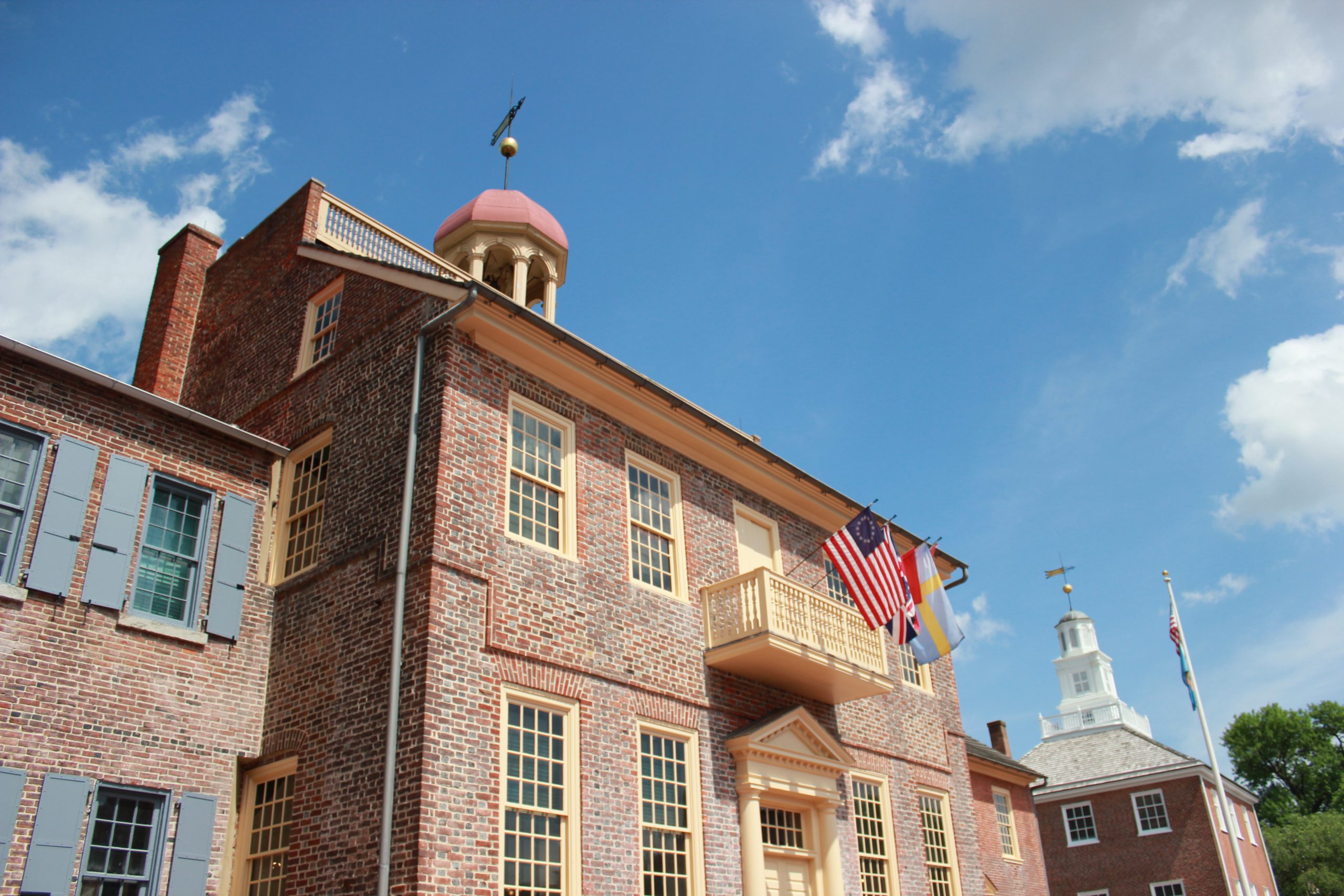 New Castle Court House Museum - a colonial style court house built of red brick with a large bell tower atop its roof