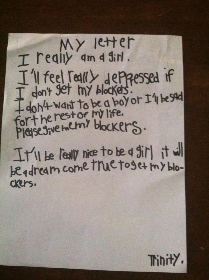 A handwritten letter from Trinity Neal to medicaid. The letter begins “ I am really a girl. I’ll feel really depressed if I don’t get my blockers.