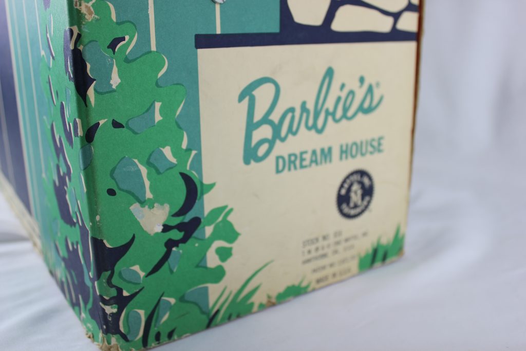 A close up of the Barbie's Dream Home logo.