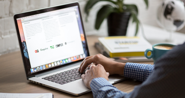 stock image of a person using a laptop