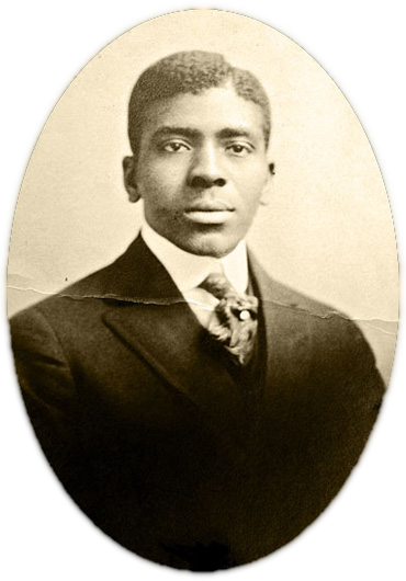 An African American man's professional portrait in an oval shape