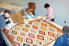 Women working on quilt